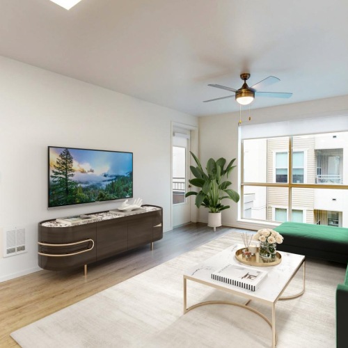 a living room with green couches