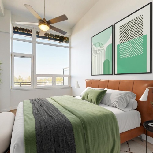 a bedroom with a bed and a fan